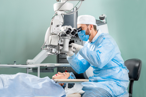 Ophthalmologist performing surgery