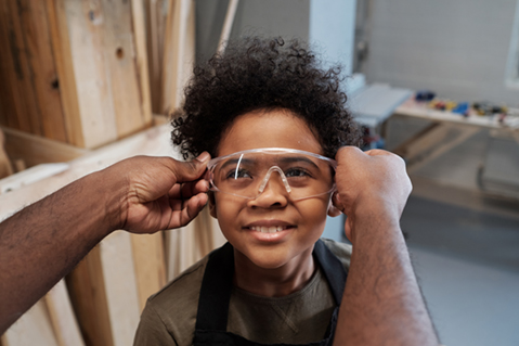 Child wearing safety goggles